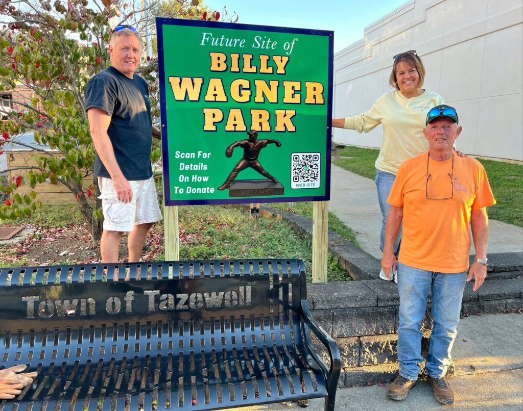 donation-sign-and-volunteers